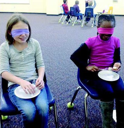Katey Krimminger and Jaydin Douglas participate in awareness activity -T