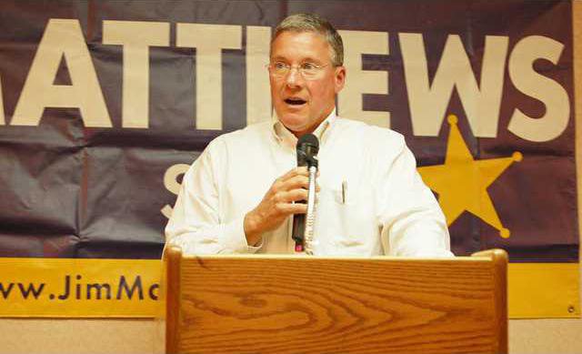Jim Matthews at podium.JPG