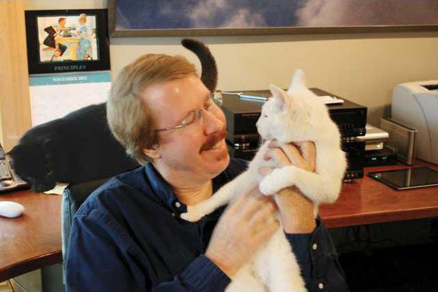 Austin Meyer with cats
