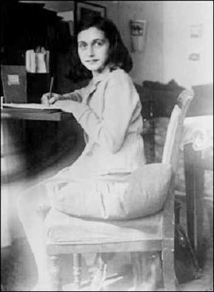 Anne Frank at her desk