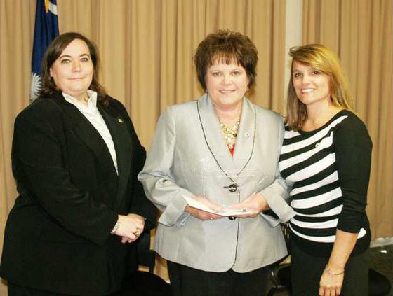 Carlene Glenn with plaque